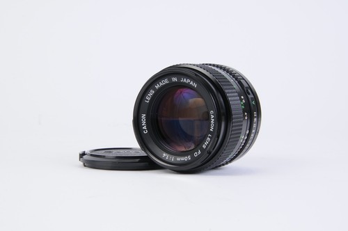 Canon 50mm n - f/1.4, (come